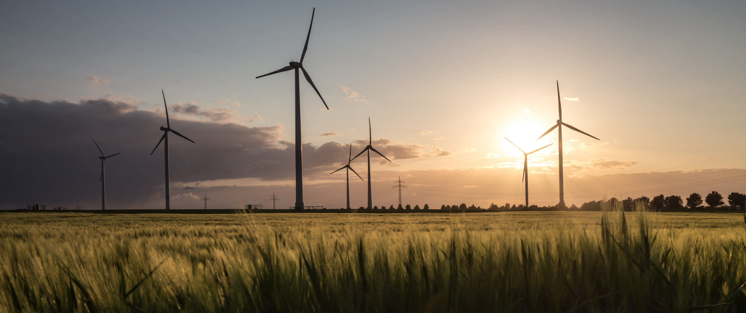 Wind turbines at sunset