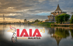 IAIA23 logo on skyline of Kuching Malaysia