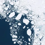 satellite image of polar ice cap in ocean