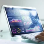 Person working with data sets on a tablet