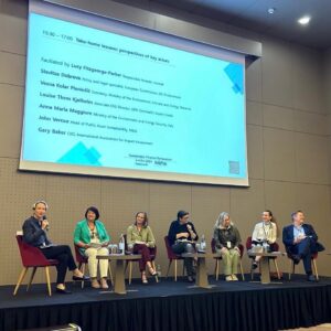 IAIA CEO Gary Baker speaks on a panel at sustainable finance symposium