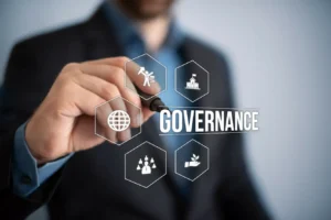 Decorative picture of person pointing at the word "governance"