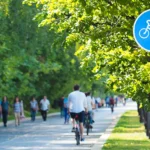 Photo of people riding bicycles on a bike path