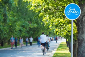 Photo of people riding bicycles on a bike path