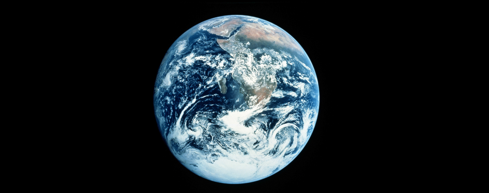 Photo of earth from space. IAIA joins Global Commons Alliance.